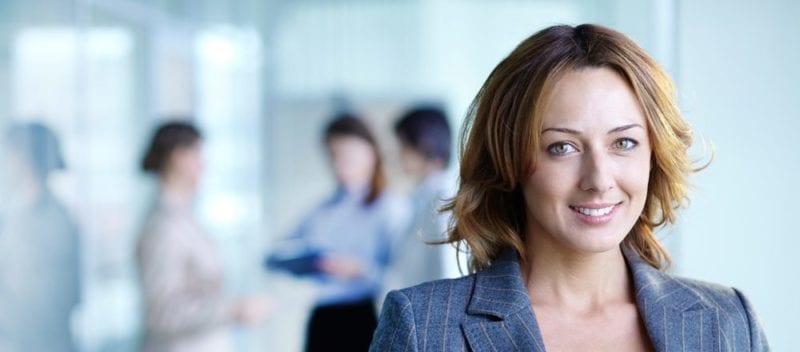 woman dressed well in office